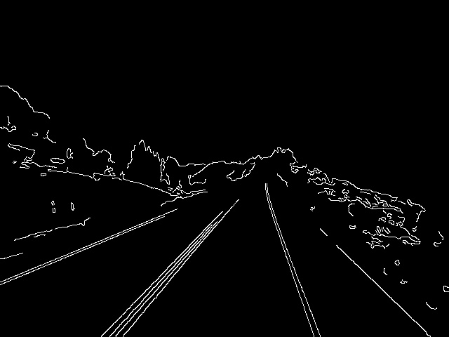 Canny edge detection map of the same road frame, showing white edge outlines of the road, lane lines, and terrain against a black background